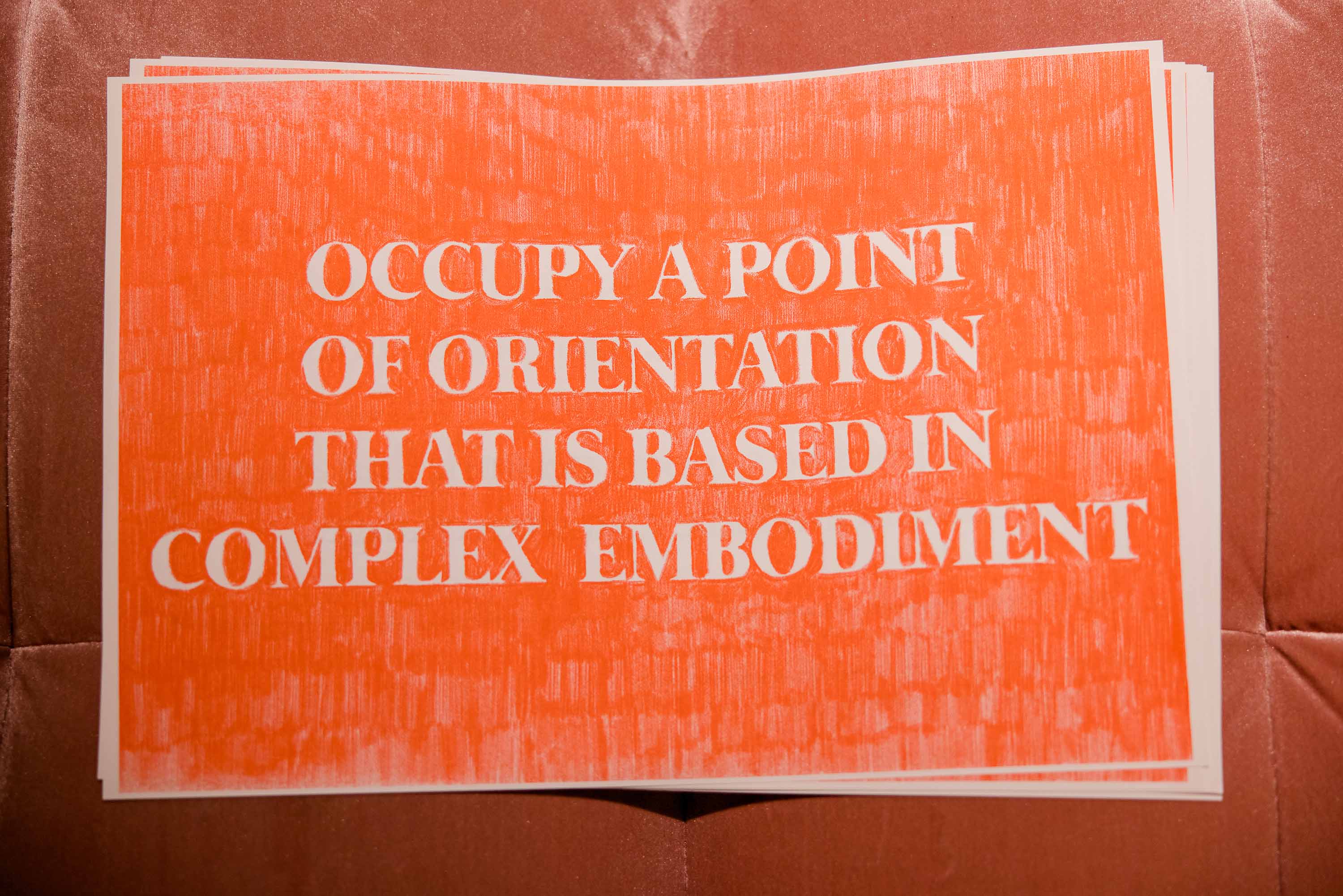 A card with orange text that reads, Occupy a point of orientation that is based in complex embodiment.
